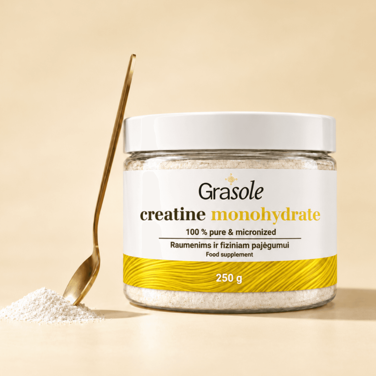 GraSole Creatine Monohydrate tub beside a spoon