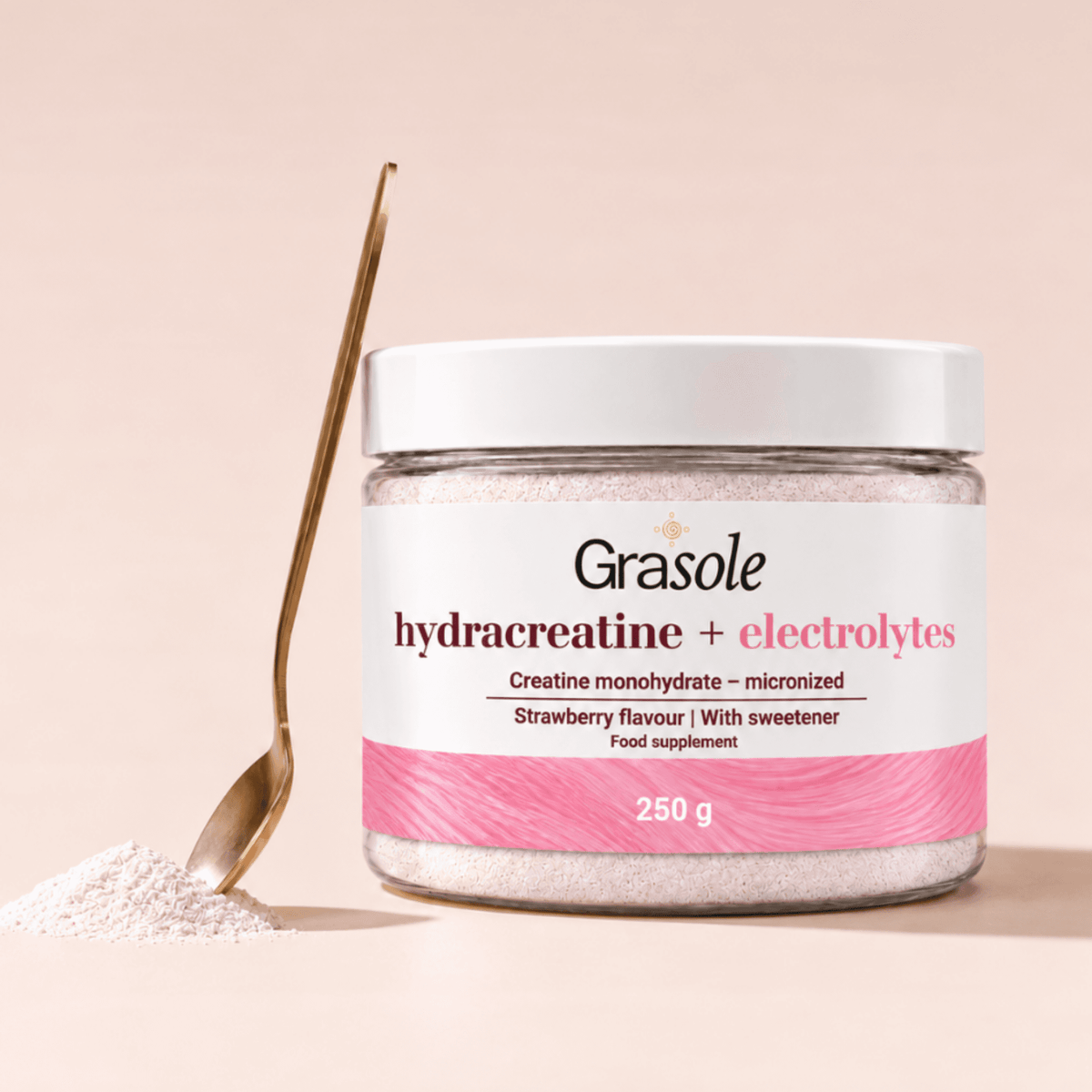 GraSole strawberry-flavoured Hydracreatine tub beside a spoon